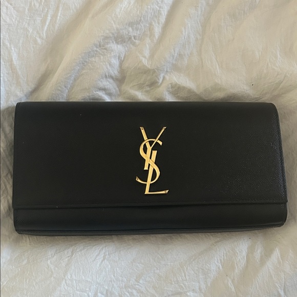 Saint Laurent Handbags - Saint Laurent Black Clutch with Gold Logo